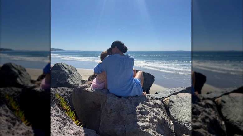 Meghan Markle and Lilibet on the beach.