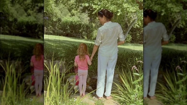 Meghan Markle outside with Lilibet.