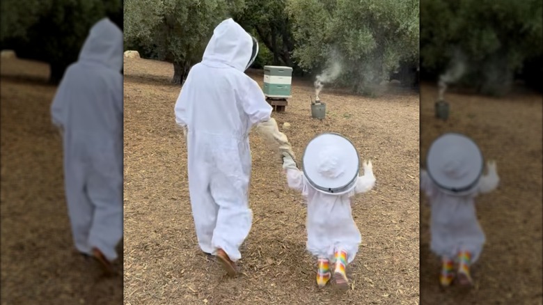 Meghan Markle beekeeping with Lilibet.