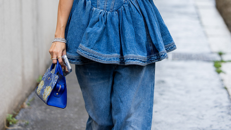 Denim dress over jeans