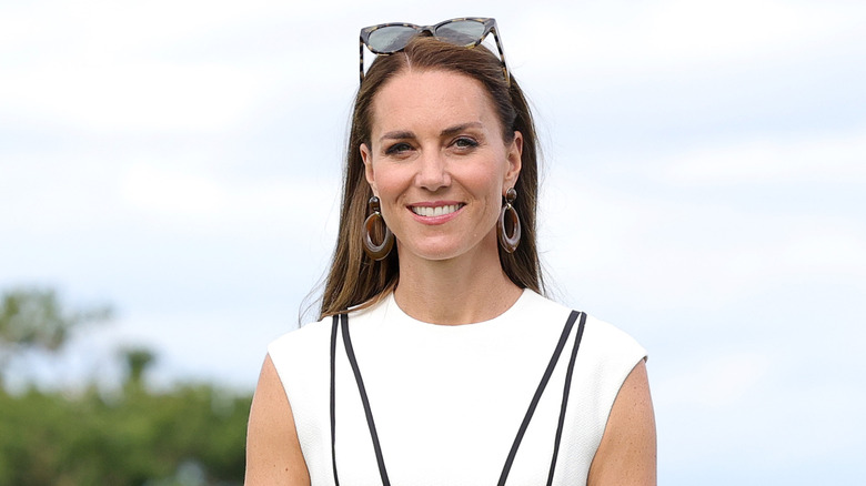 Kate Middleton wearing a white dress