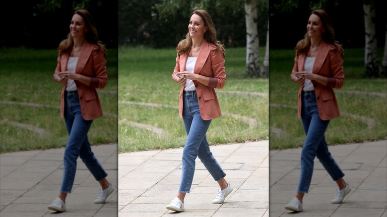 Kate Middleton wearing jeans and sneakers