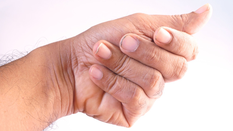 dirt underneath fingernails