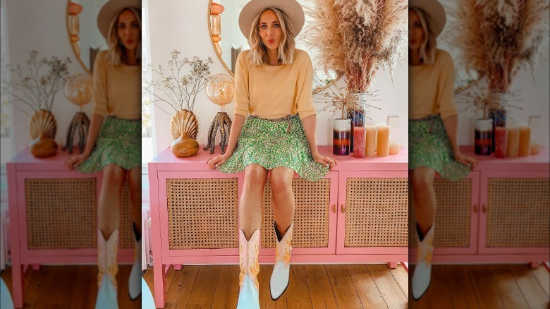 Woman wearing yellow and green outfit