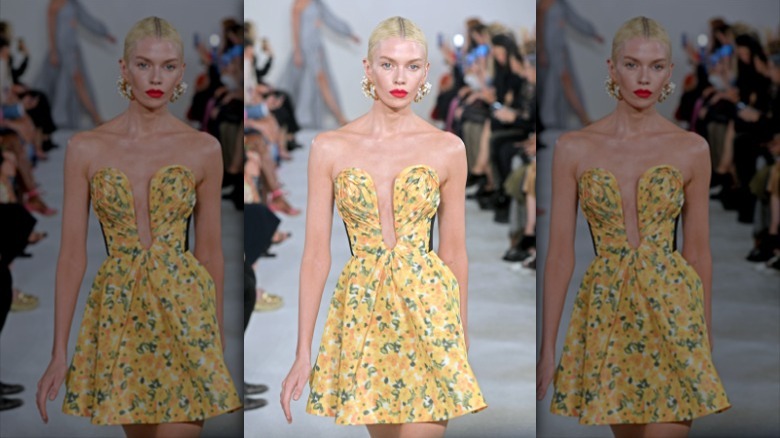 model walking down Carolina Herrera runway