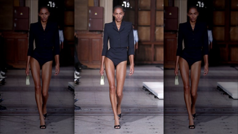 model walking down Coperni show