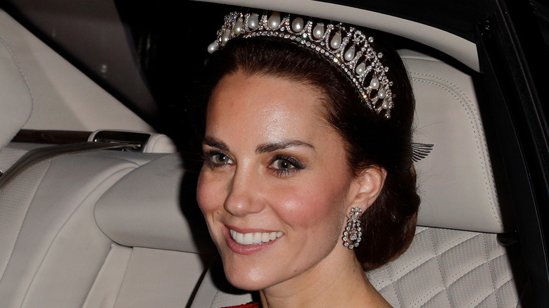 Kate Middleton wears the Lover's Knot tiara in a car