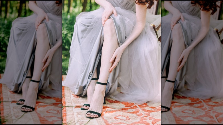Burgundy bridal pedicure and black sandals