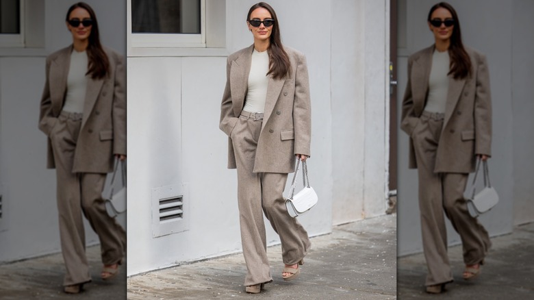 Woman in neutral blazer suit