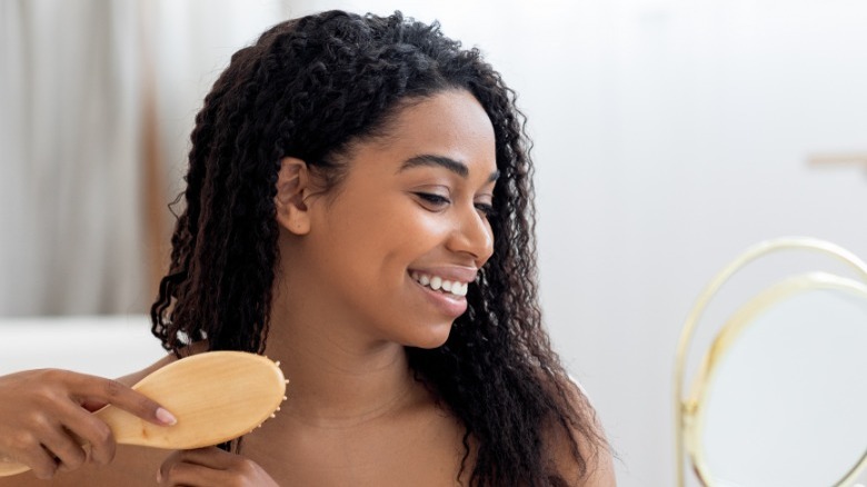 Woman brushing her hair