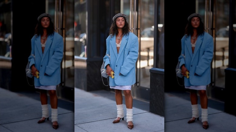 woman wearing white leg warmers