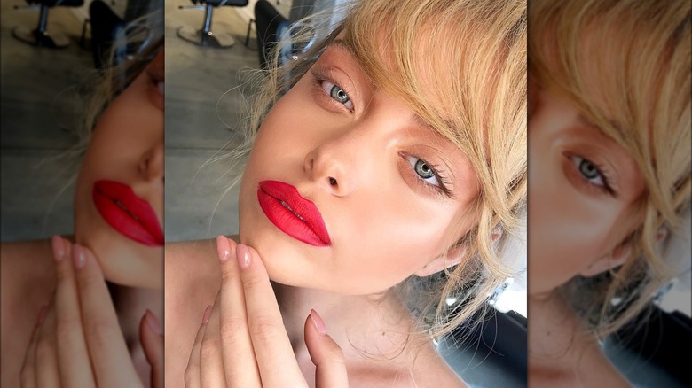 girl wearing a red lip