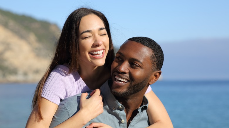 happy couple at the beach