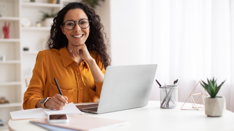 Woman working at table 