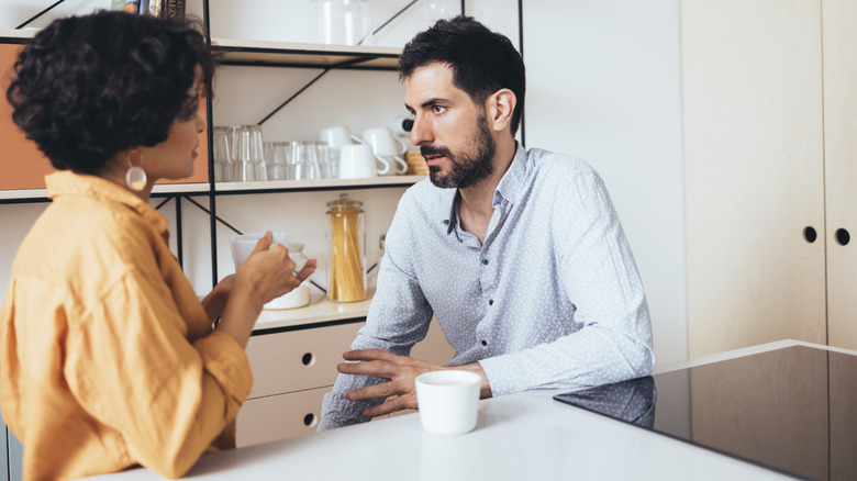 woman talking to man