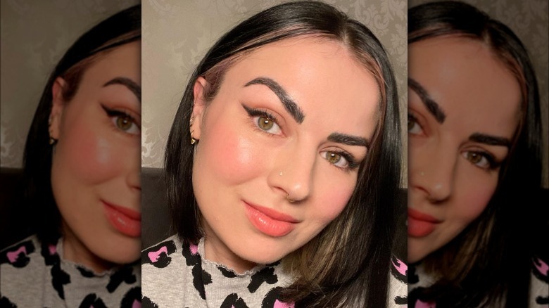 Woman wearing soft black wing