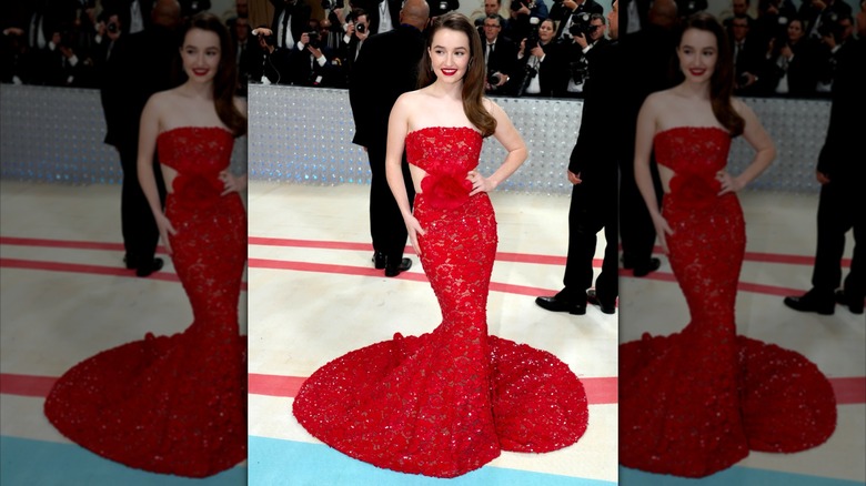 Kaitlyn Dever in a red lace gown at the 2023 Met Gala.