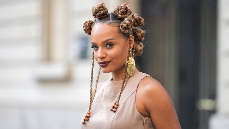 Alicia Aylies wearing braided hair buns