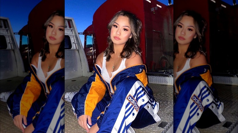 Girl wearing windbreaker set