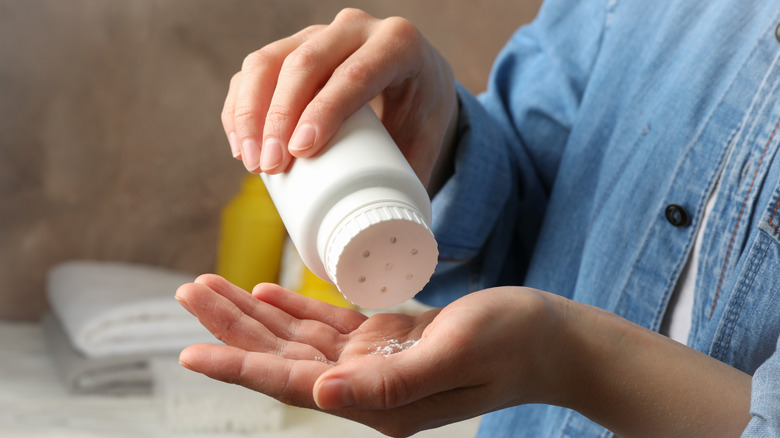 Woman holding baby powder