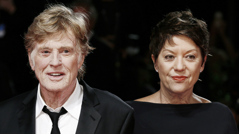 Robert Redford and his wife, ﻿﻿Sibylle Szaggars, dressed in black outfits at an event in Venice