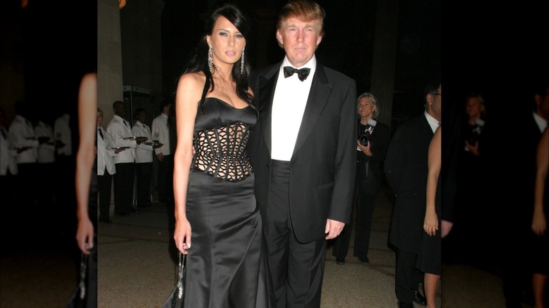 Donald Trump and Melania Trump pose for photos inside the 2004 Met Gala