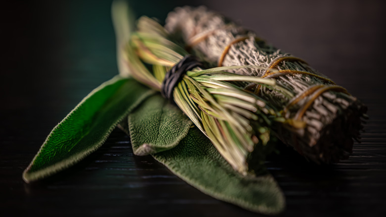 Sage and sweet grass on a black background