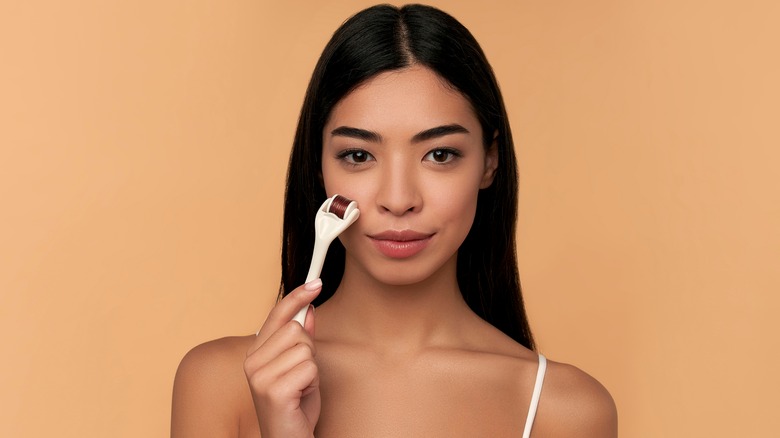 Microneedling procedure on cheek