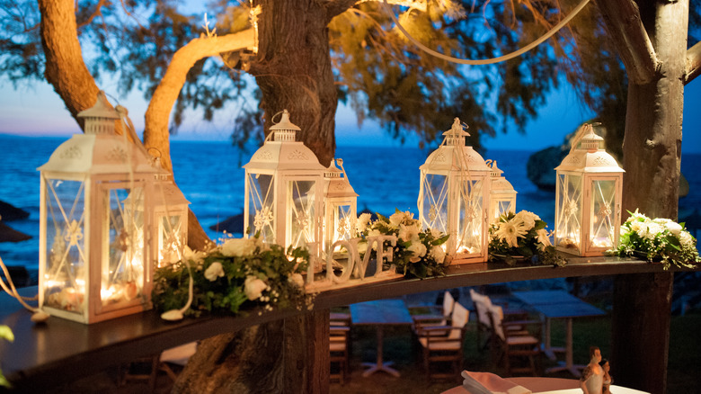 White lanterns wedding setup