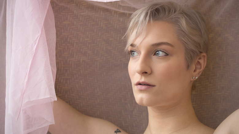 Woman with shaggy pixie cut