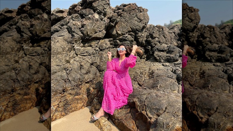 woman wearing hot pink maxidress
