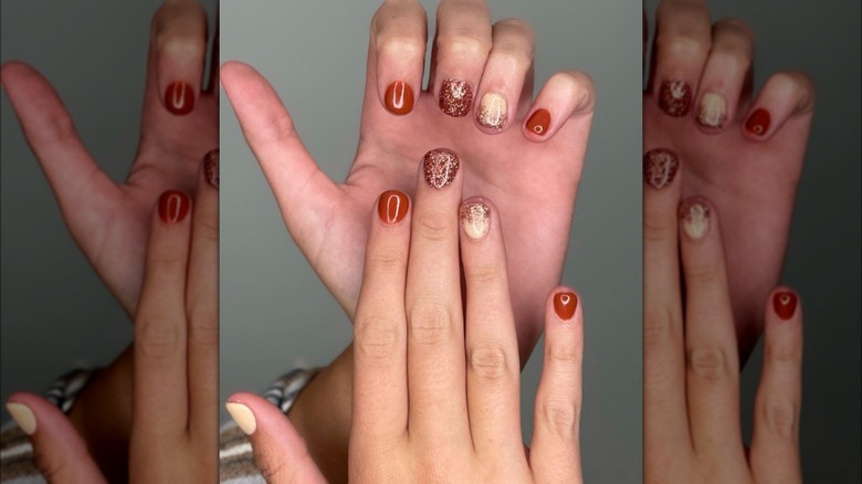 Amber and cream glitter nails