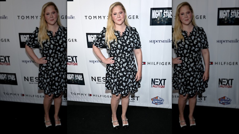 Amy Schumer in a floral dress