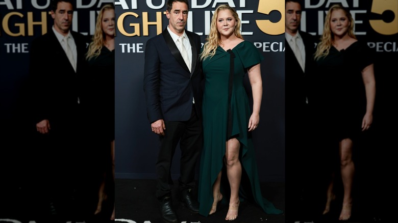 Amy Schumer and Chris Fischer at the SNL 50 special