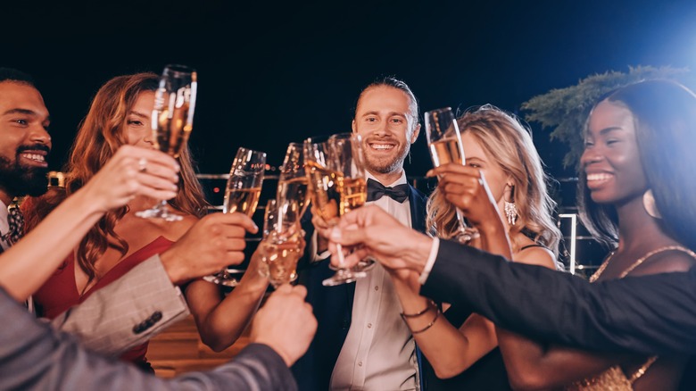 guests toasting at wedding