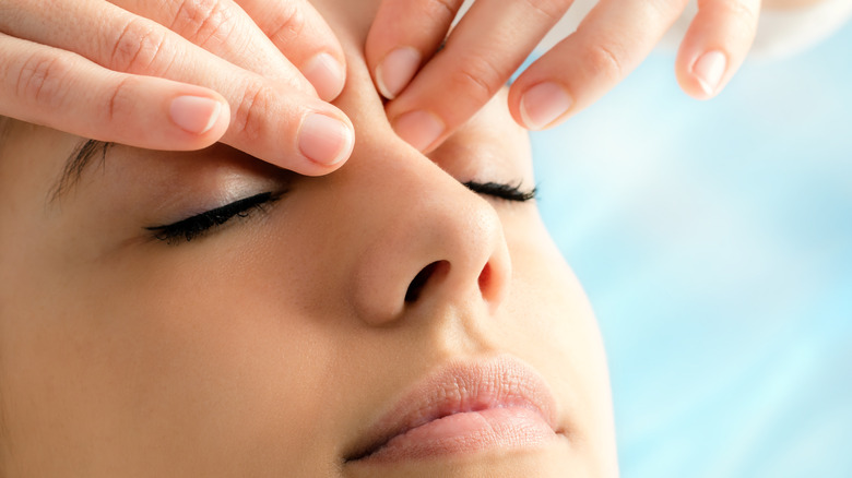 woman getting facial massage