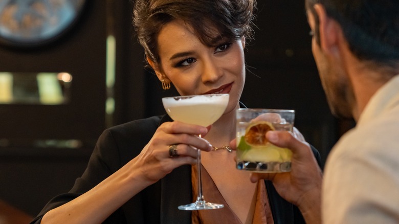 Man and woman flirting in bar