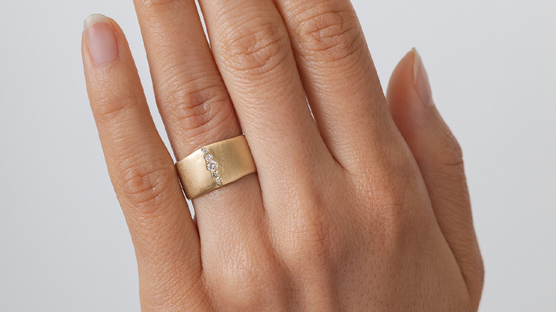 chunky engagement ring on hand