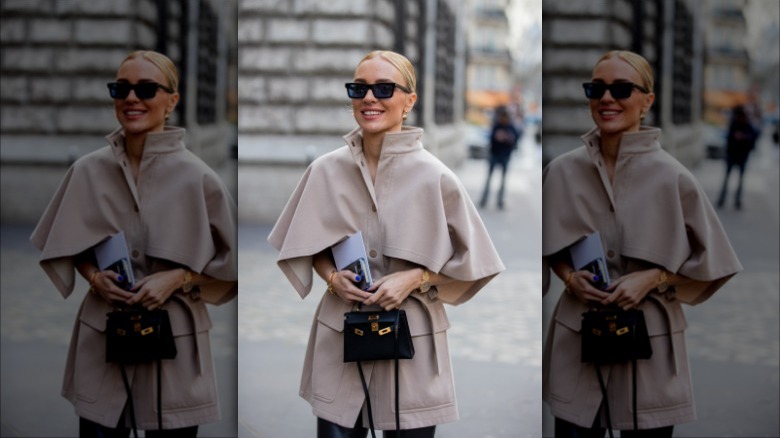 woman wearing gold watch