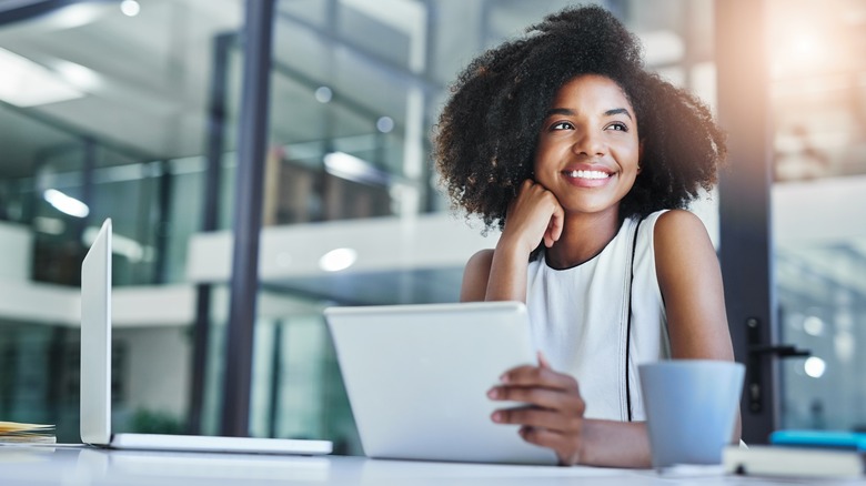 woman happy while working