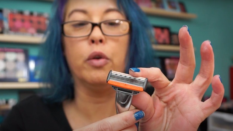 Woman reviewing Angel Shave Club's razor