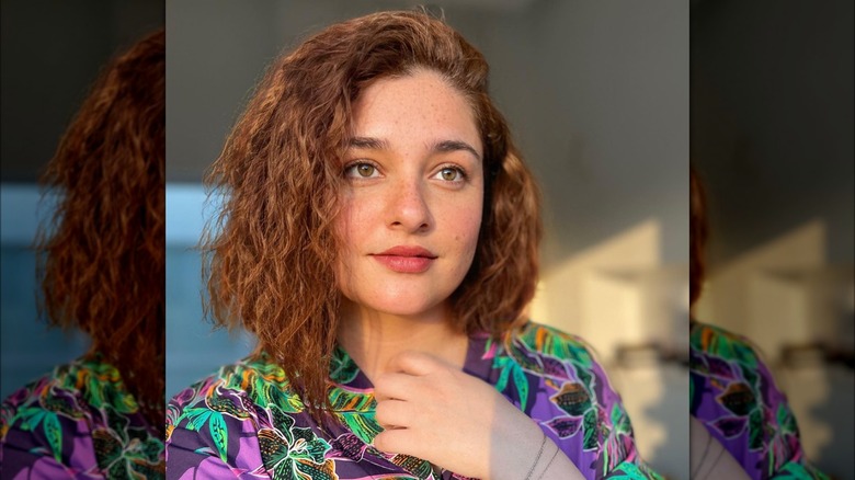 woman with curly hair bob