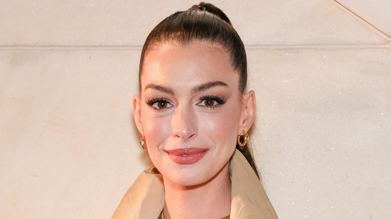 Anne Hathaway with a high ponytail