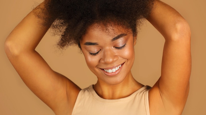 female showing underarm