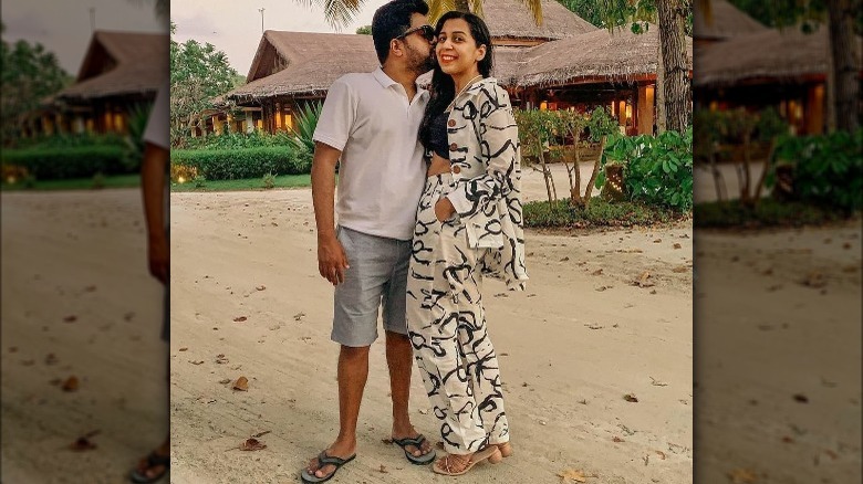 Woman wearing balls as heels.