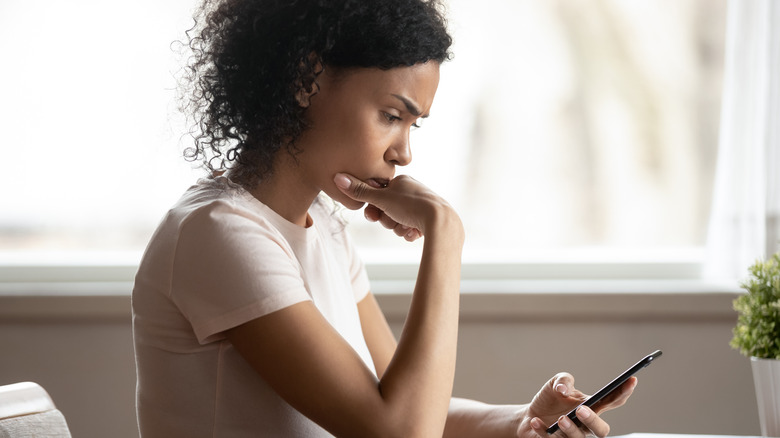 Woman looking at her phone