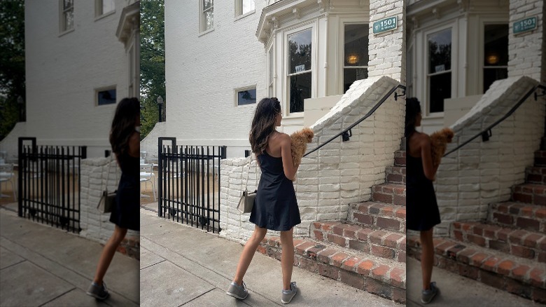 woman wearing exercise dress and sneakers