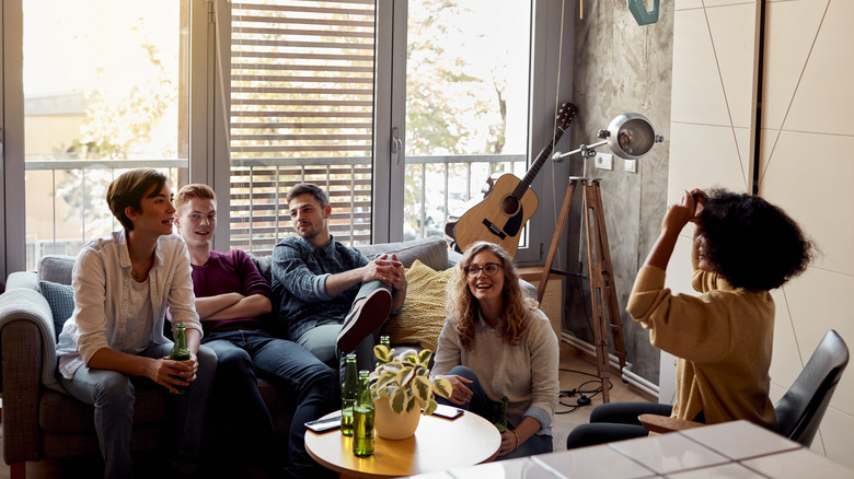 Roommates hanging out in living room