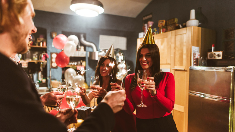 Friends celebrating with sparklers