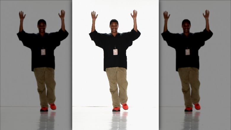 Telfar Clemens waving at his fashion show